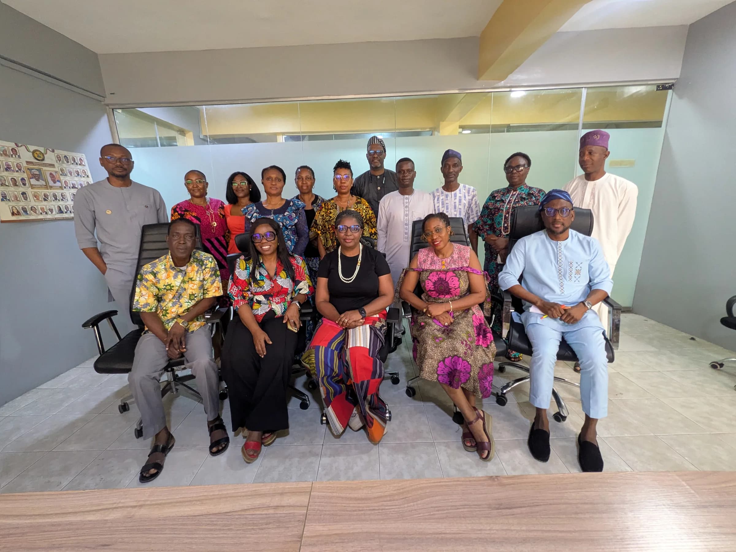 A second seated group photograph of the same meeting.