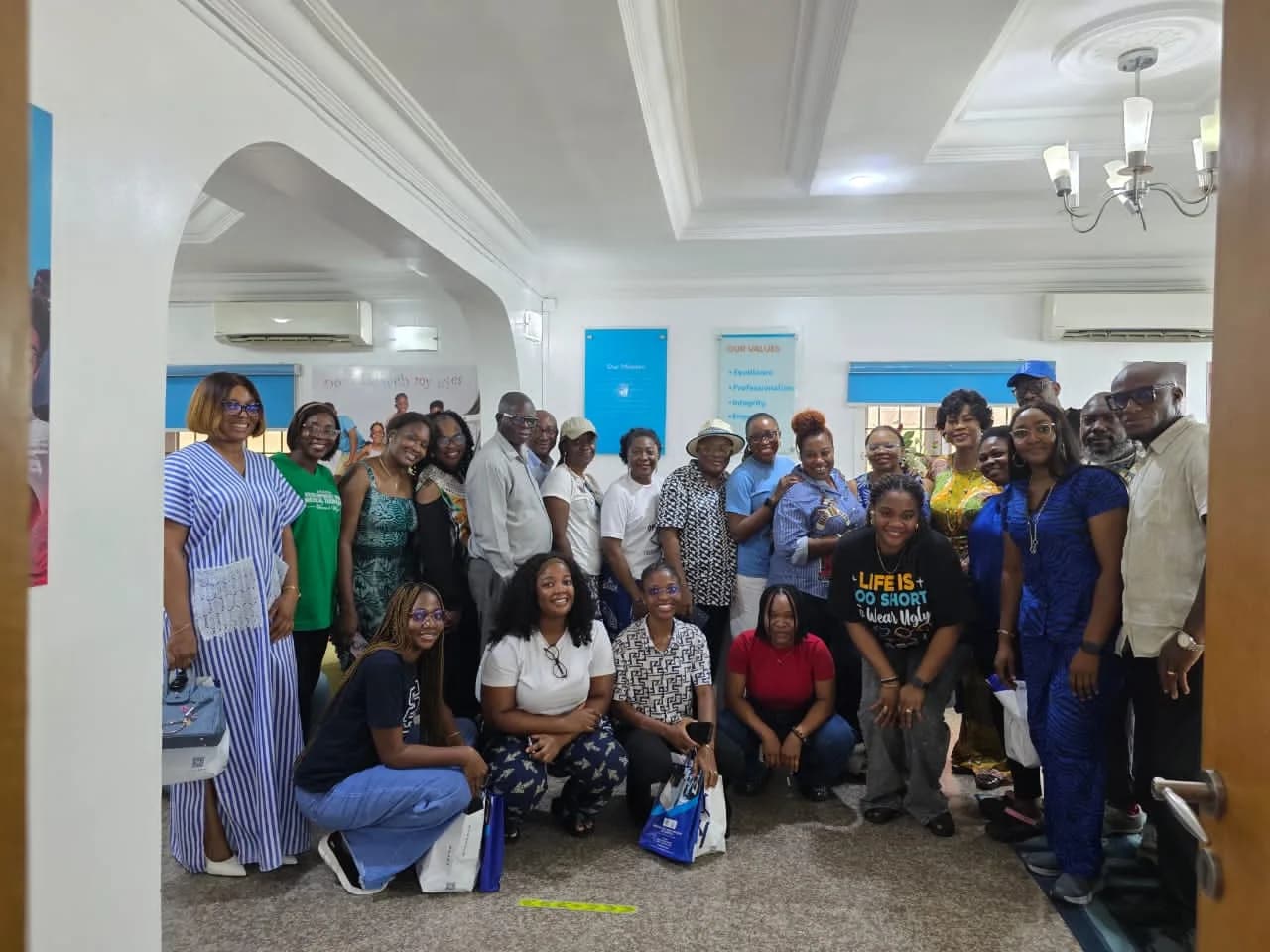 Members assembled in the hall for a group photograph at the end of the meeting.